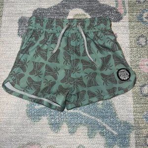 The Little Surfer Dude lined swim trunks 6-12m